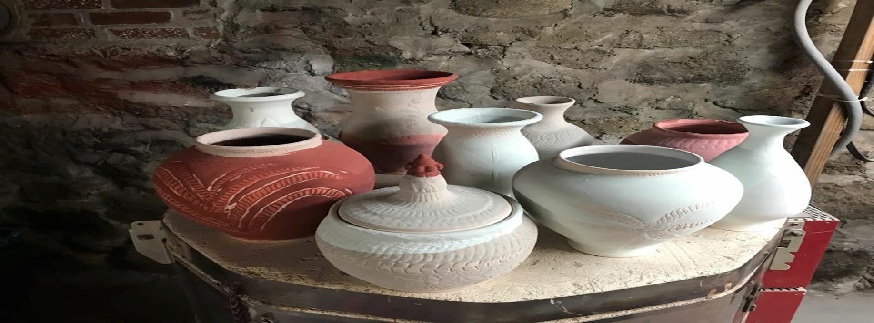 wood fired pots and vases created on the potters wheel by local artist John Kondra Dracut Ma.