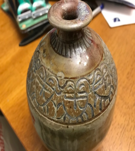 hand carved bottle by pottery by jamd